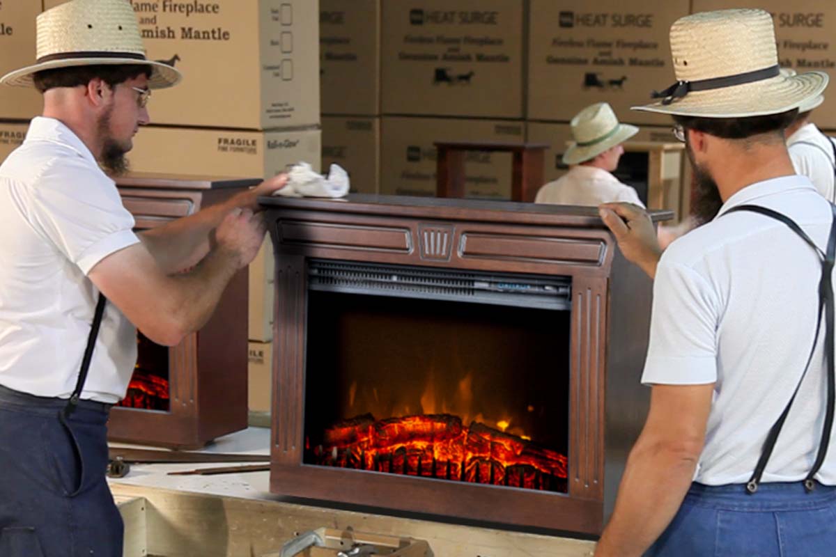 Amish working on Heat-n-Glow Fireplace