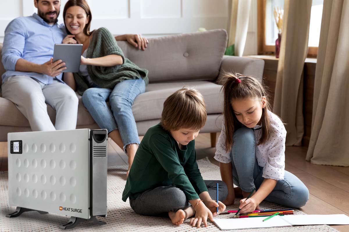 Two kids with a coloring book on the floor near a Power Panel with their parents in the background