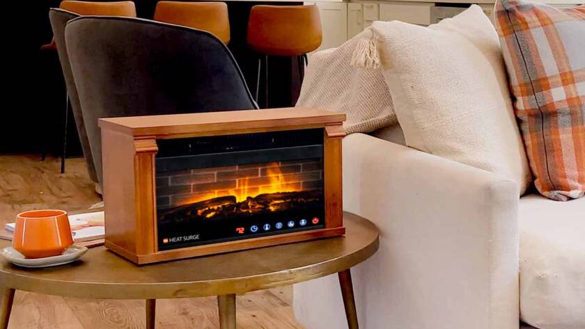 A Multi-Color Mini Glo Widescreen on a side-table next to a living room set