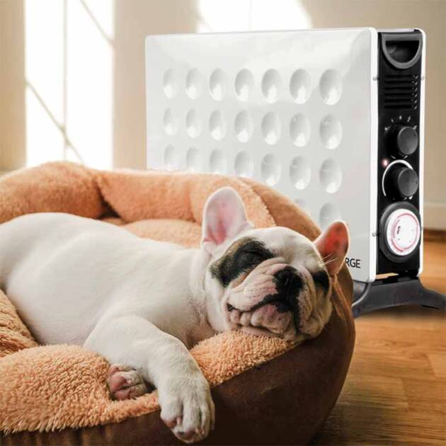 A dog sleeping soundly in a dogbed next to a Power Panel Original